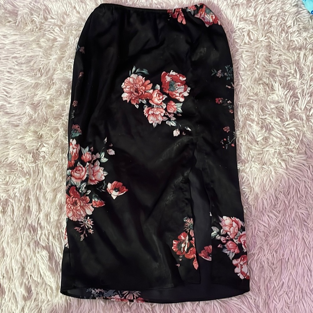 Black midi skirt with pink flowers, slit on bottom right side